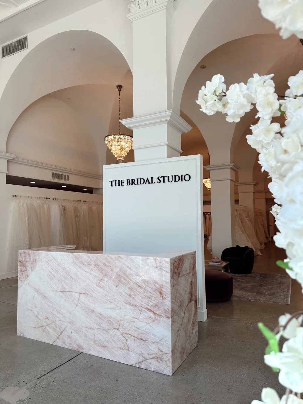 Model wearing a white gown